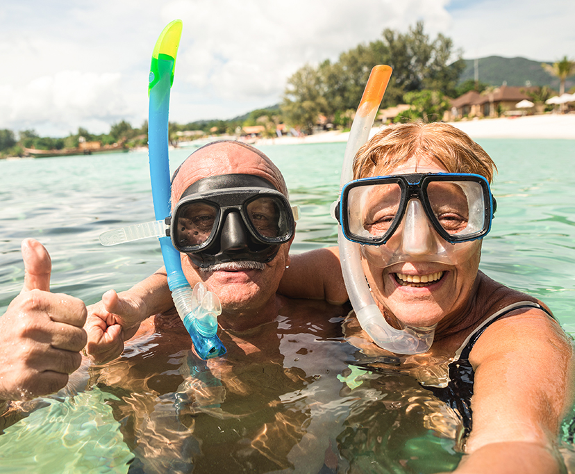 Older couple scuba diving